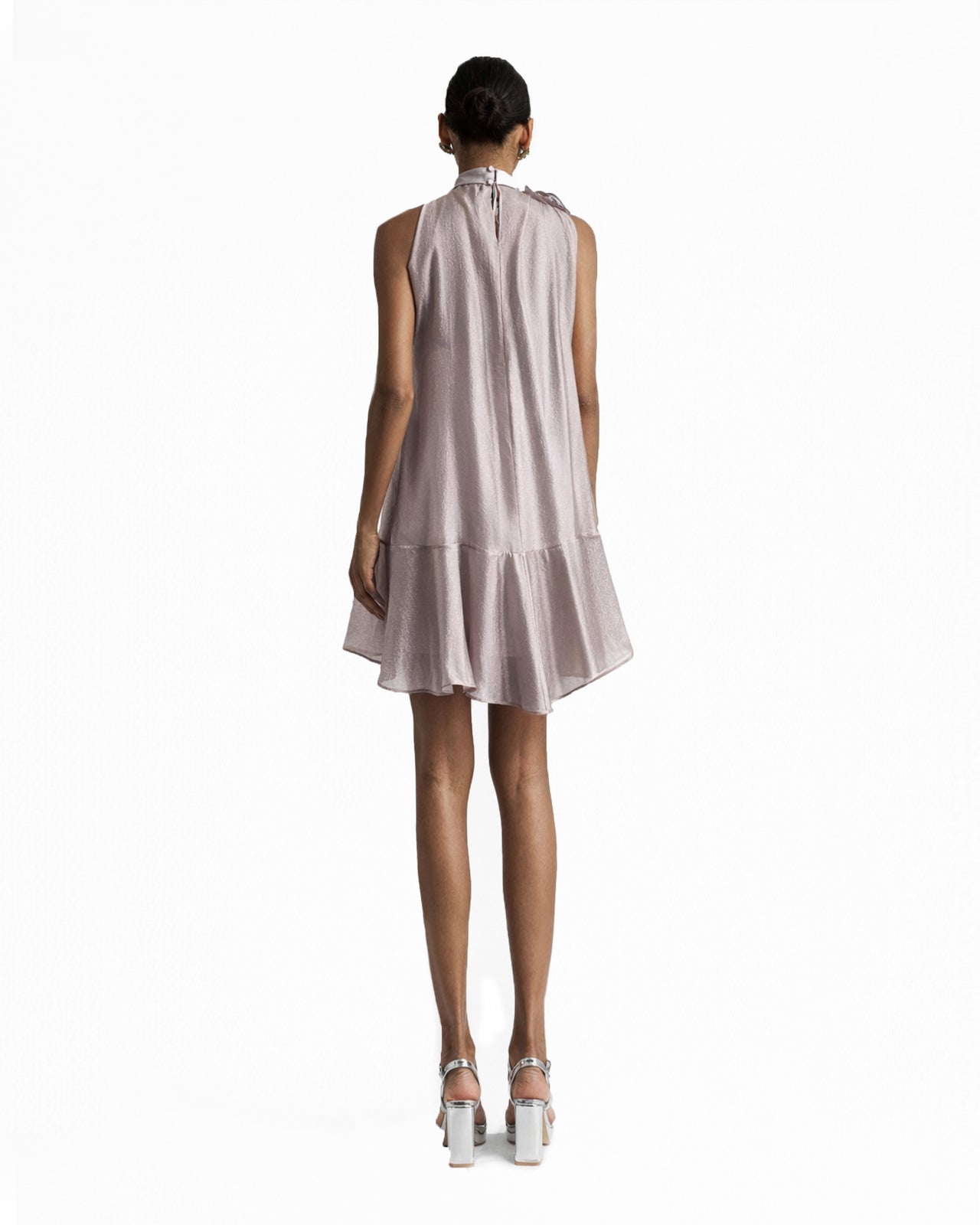 Short Dress Featuring A Flower Design