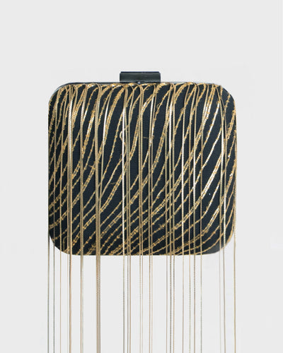 Clutch With Metallic Fringes