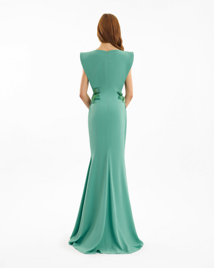Green evening gown on a white background