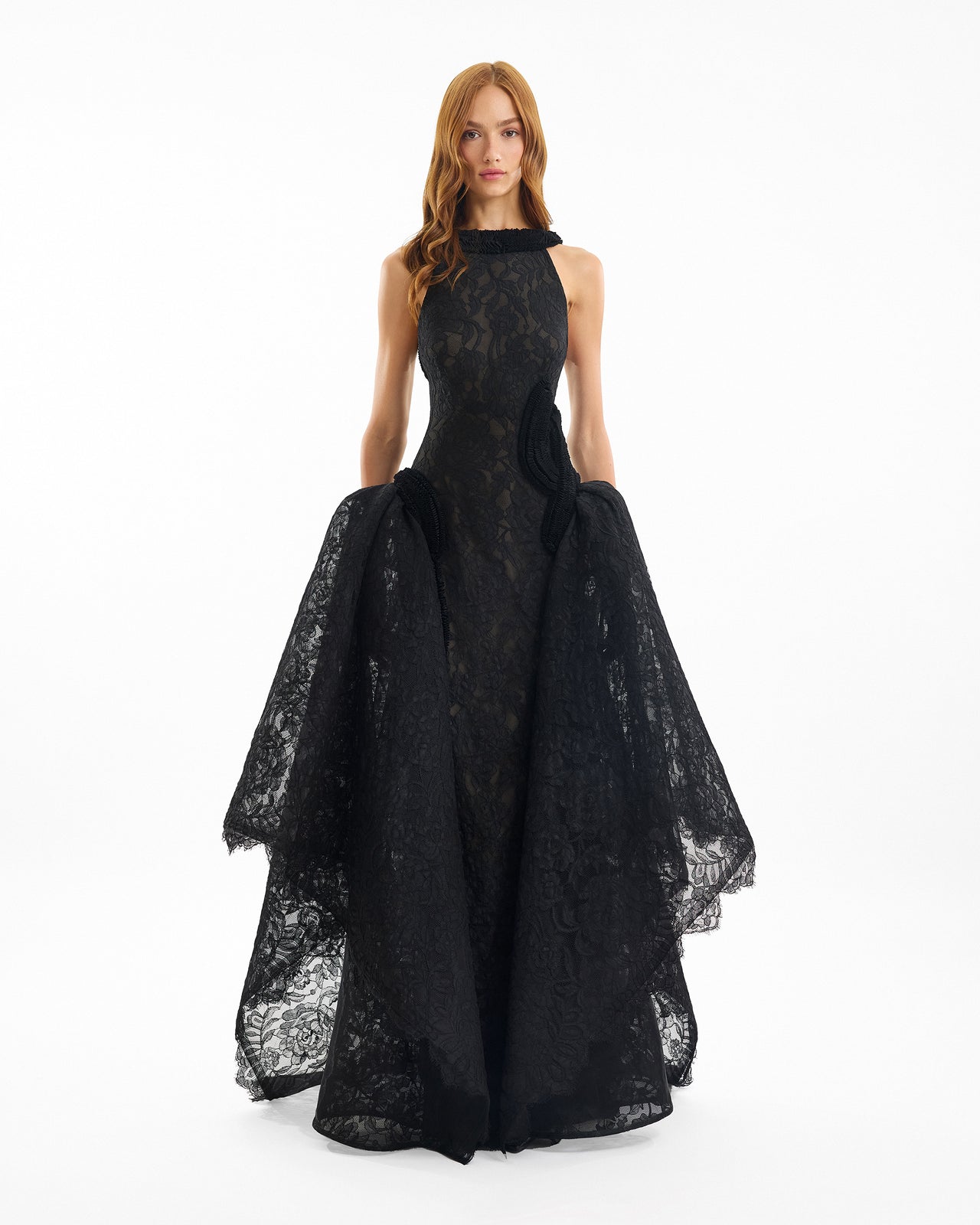 Black lace evening gown on a white background