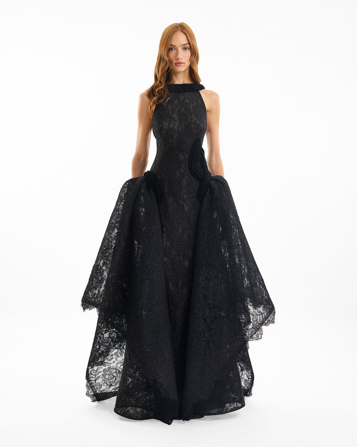 Black lace evening gown on a white background