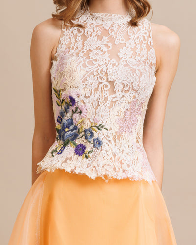 A Voluminous Skirt With A Halterneck Lace Top