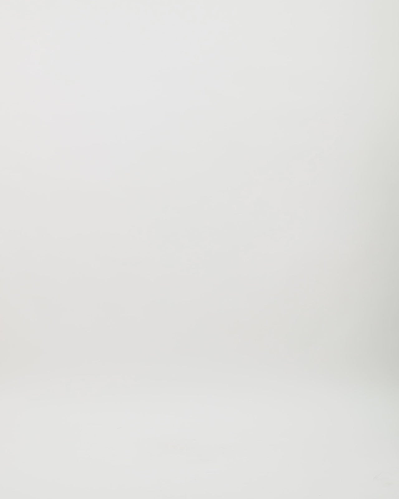 Video showcasing a strapless lace midi dress with a voluminous embroidered skirt, styled with a black velvet draped bolero. The video highlights the dress’s movement, fabric details, and full look from various angles.