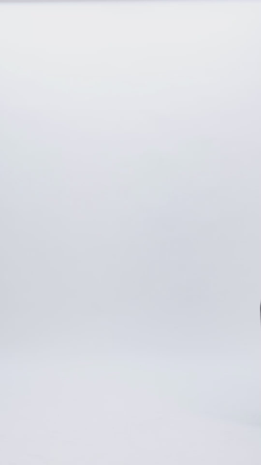 An evening wear black set featuring an off-the-shoulders, sweetheart beaded neckline top paired with wide pants with slits at the front.