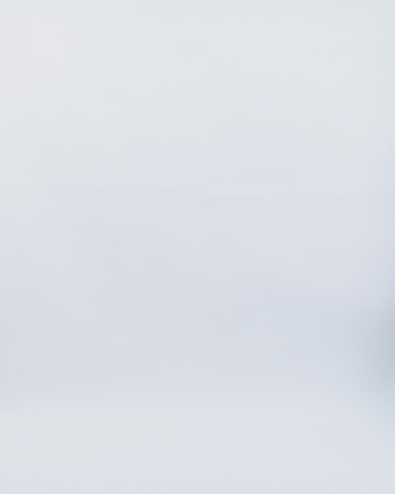 A long black evening dress featuring a beaded tassels bodice on a wide mikado skirt.