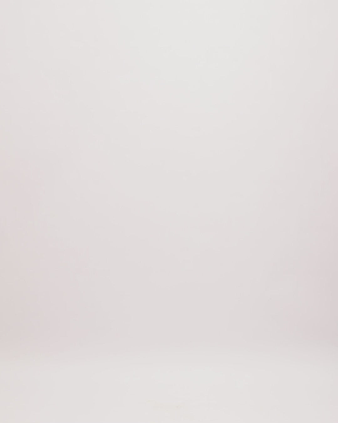 A V-neckline fully beaded short evening dress with cut-outs on the sides and back.