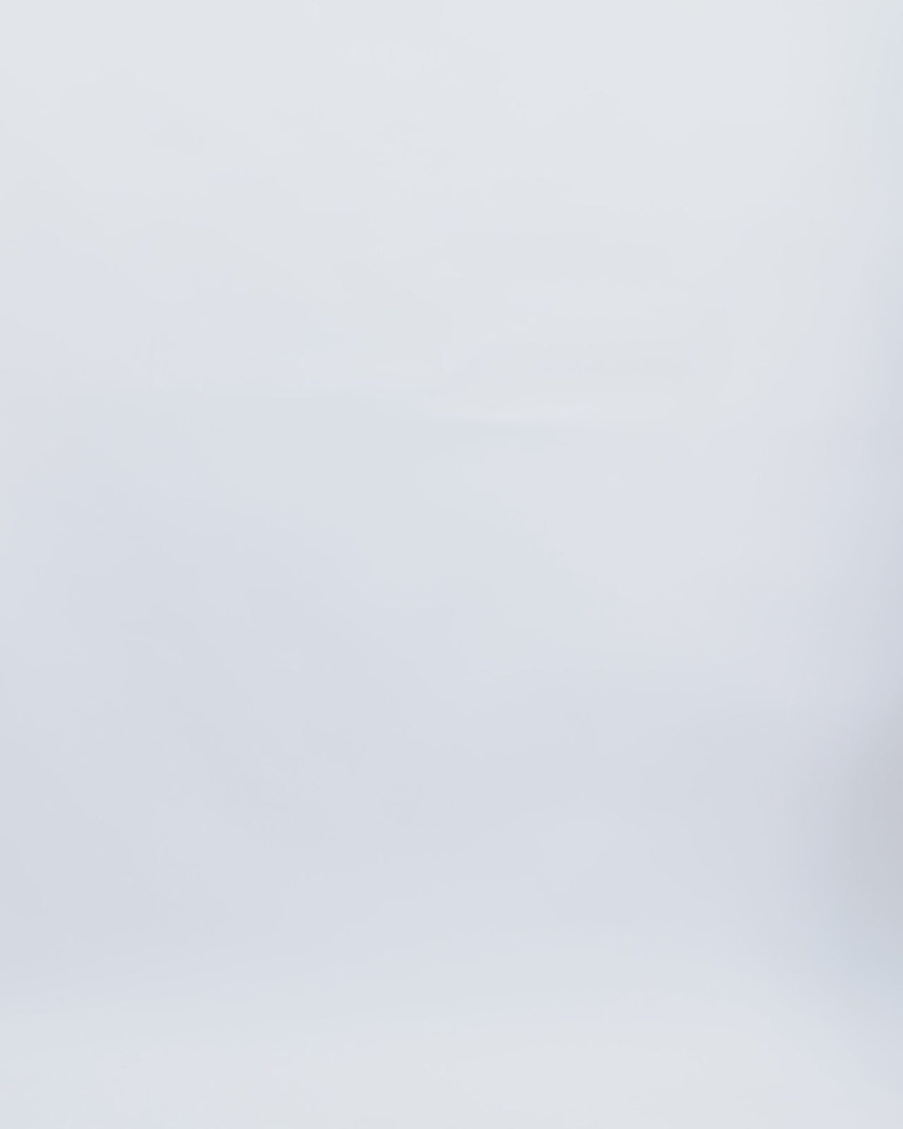 An evening wear set featuring a high-collar beaded fringes top in copper color paired with flared pants.