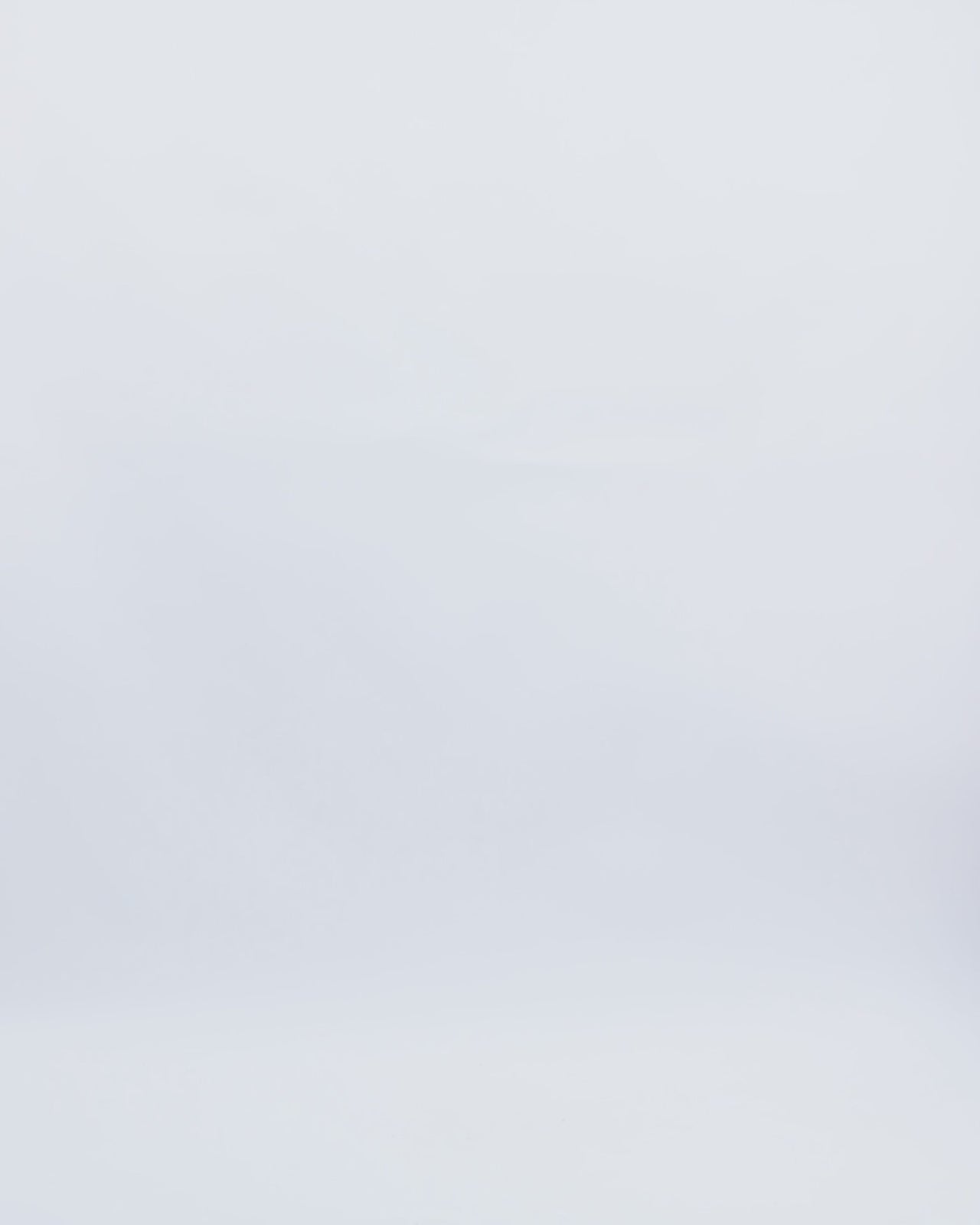 A long fully sequined copper evening dress with a draped corset and beaded straps and open back.