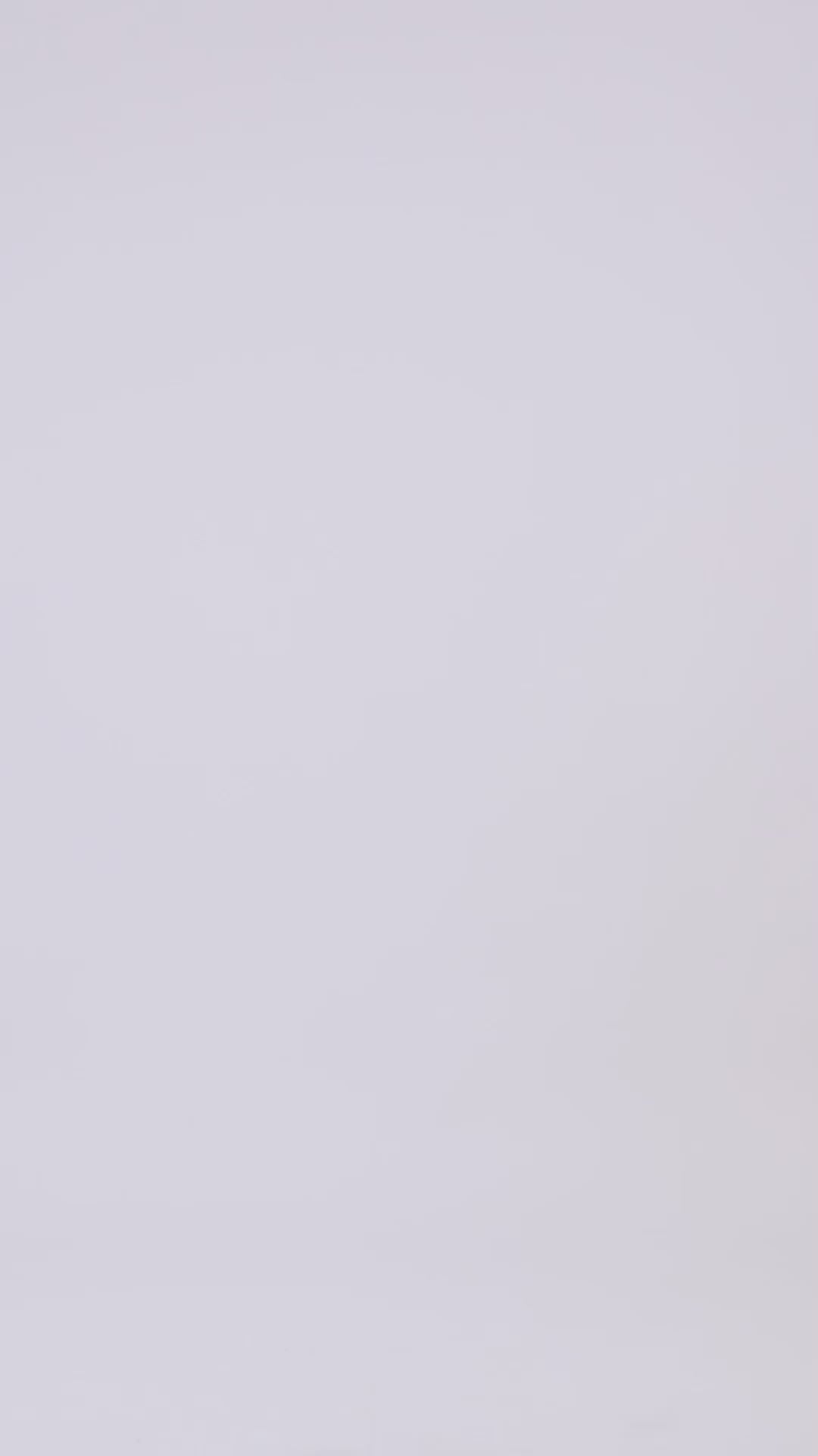 A long yellow dress featuring draping on the waist, beaded neckline and an open back.