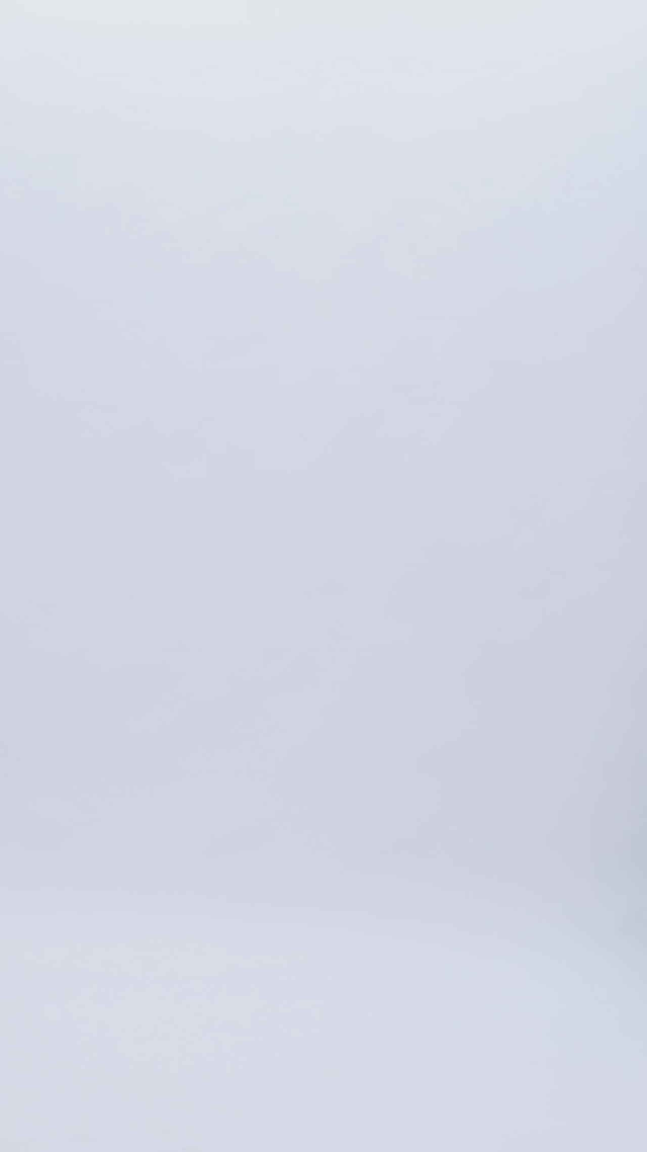 An off-the-shoulder corset grey evening dress with beading details on the neckline, draped sleeves and a flared skirt.