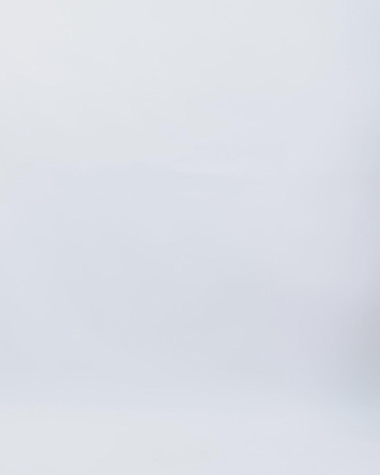 An evening wear set featuring an off-the-shoulders copper sequins top paired with a flared pant.