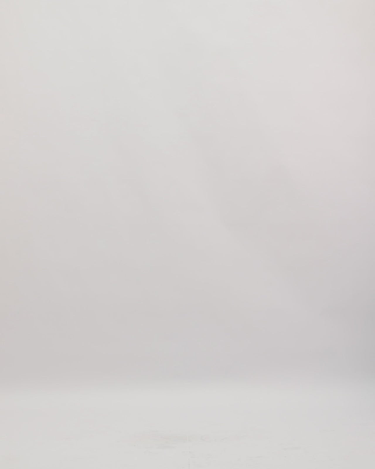 A V-neckline blue evening dress with a beaded corset and a flowy silk chiffon skirt.