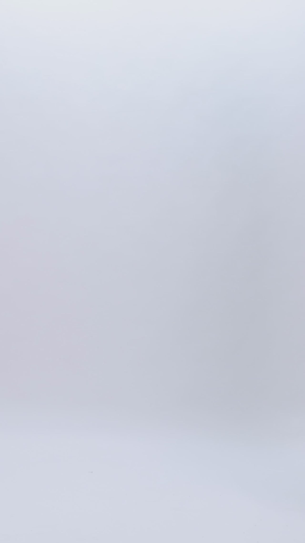 A strapless dubetti-like bodice long lilac evening dress with draping details, a bow design on the waist, and a slit on the side.