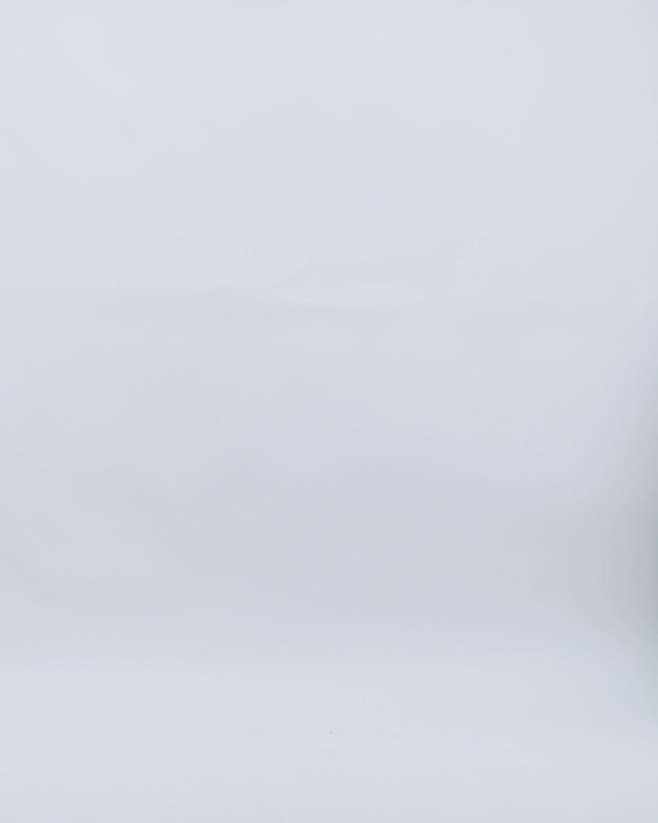 A long evening dress featuring a fully beaded corset and a wide draped mikado skirt.