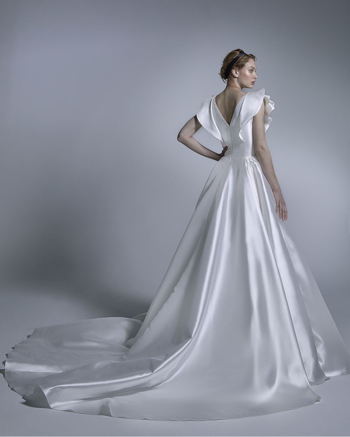 Plunging V-Neckline With Drapery Details Gown